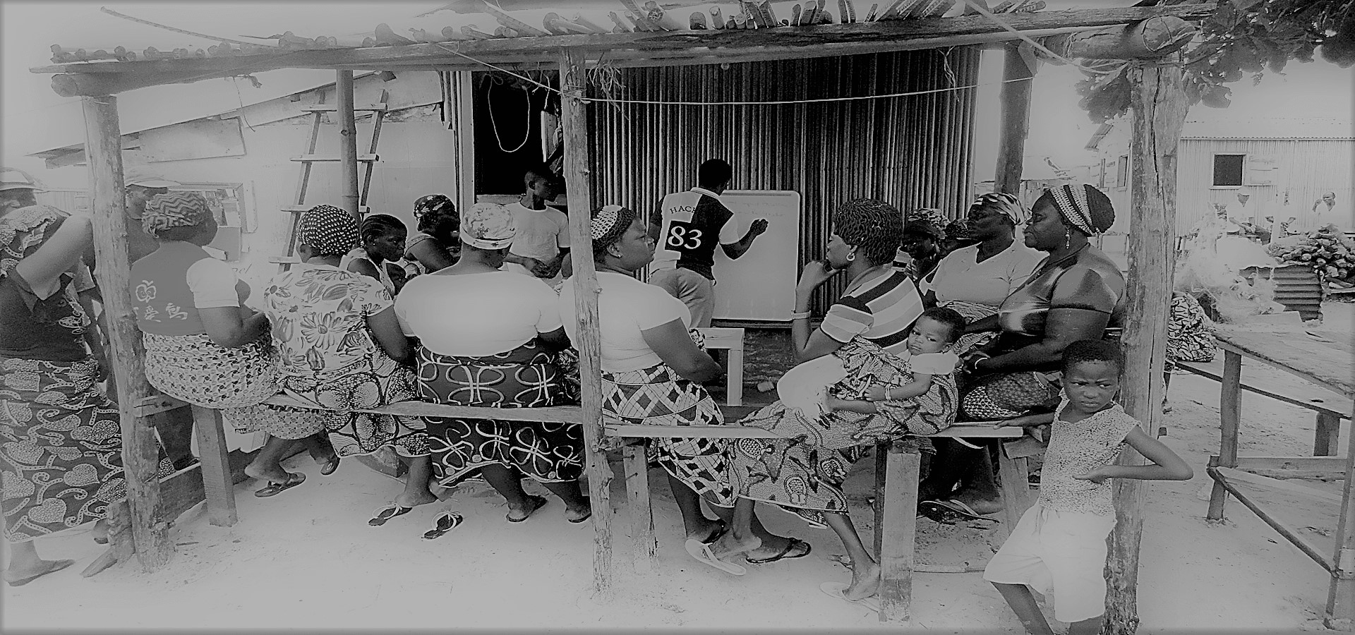 ECOPRO leadership with some women in a community